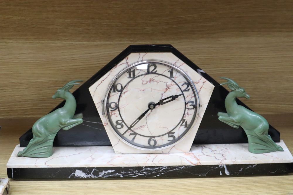 An Art Deco spelter and marble clock garniture, W.45cm, H.29cm